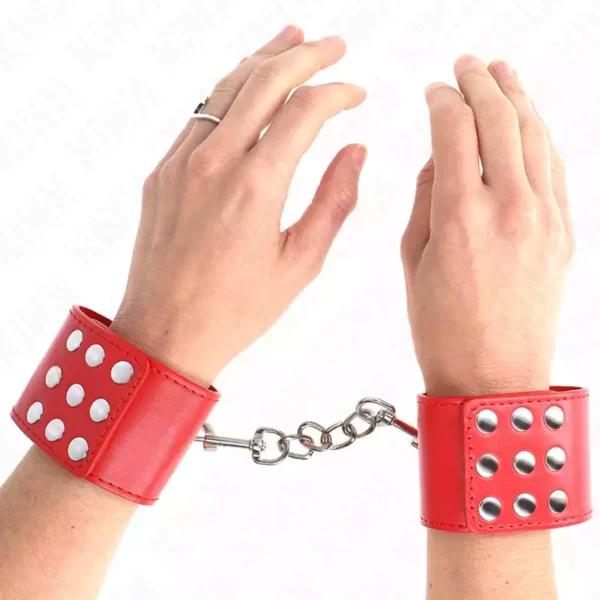Kink – Appui-poignets avec bouton-pression rouge réglable 19-24 cm x 5,5 cm Kink – Appui-poignets avec bouton-pression rouge réglable 19-24 cm x 5,5 cm – BDSM & fétichisme